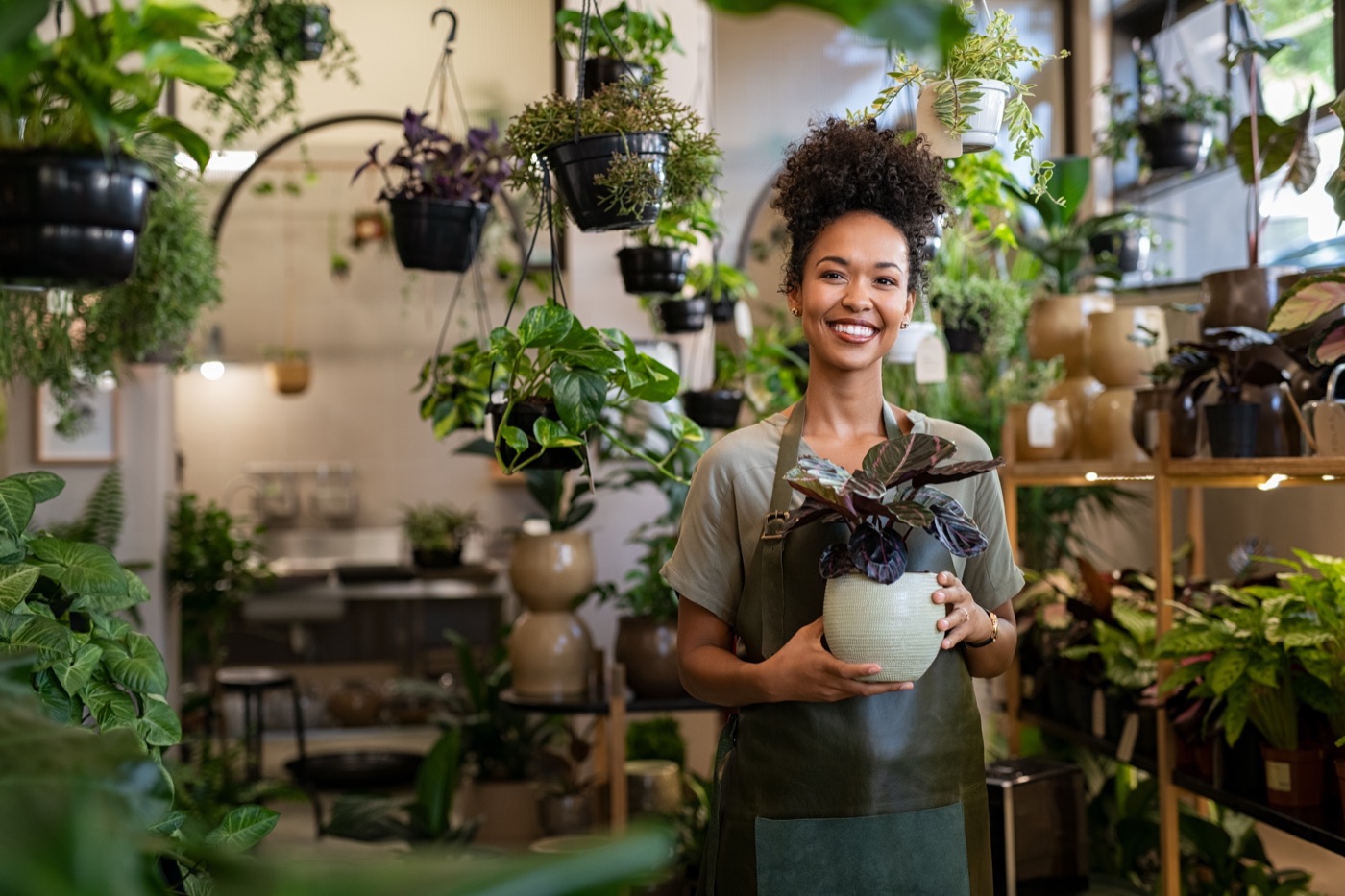 A florist arranging flowers in their shop